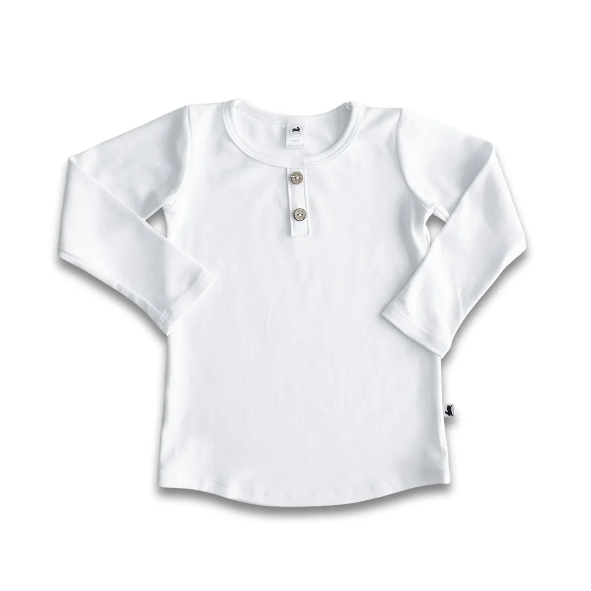 White long sleeve toddler shirt with two buttons and crew neck on plain background