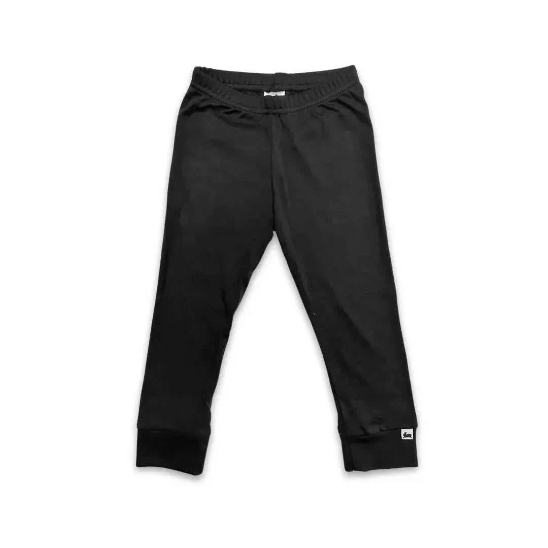 Black youth bamboo leggings with elastic waistband on white background