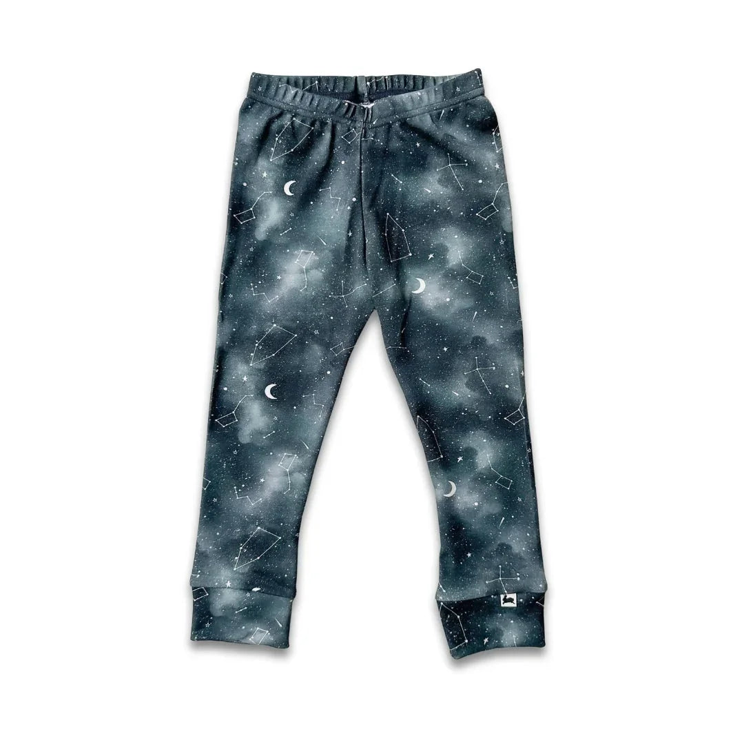 Kids' jogger pants with dark galaxy print, white moons and constellation patterns
