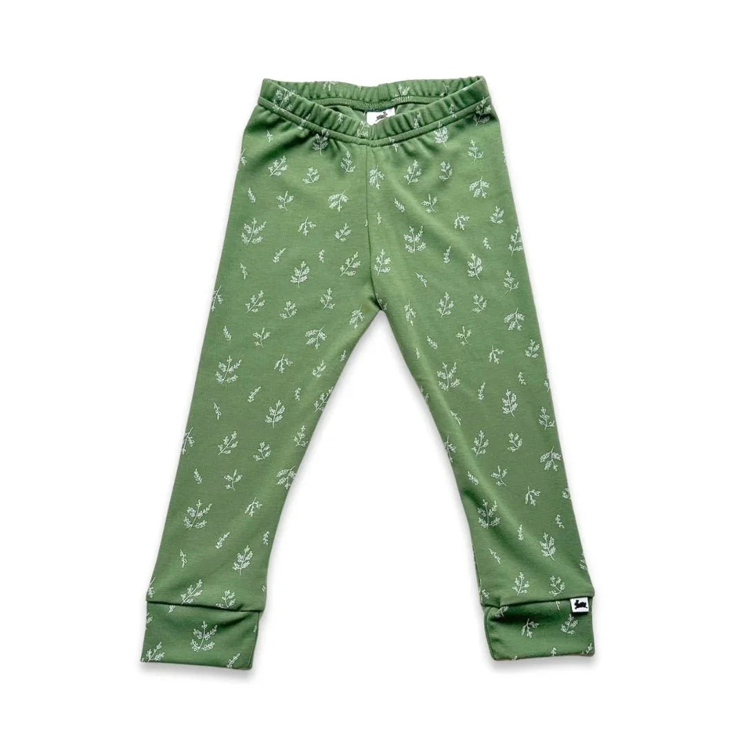 Green bamboo leggings for youth with white leaf print, elastic waist, Little & Lively label