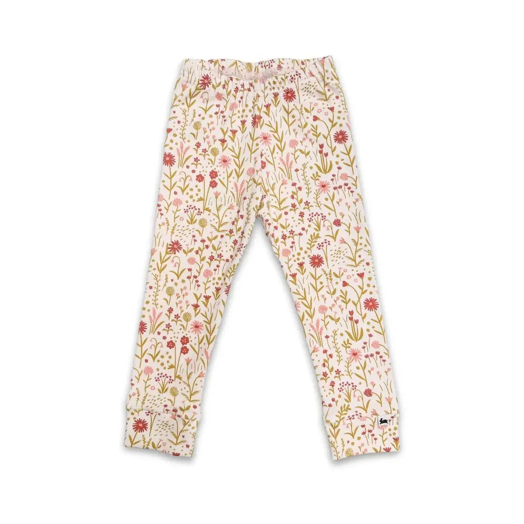 Youth bamboo leggings with pink and green floral print on a cream background