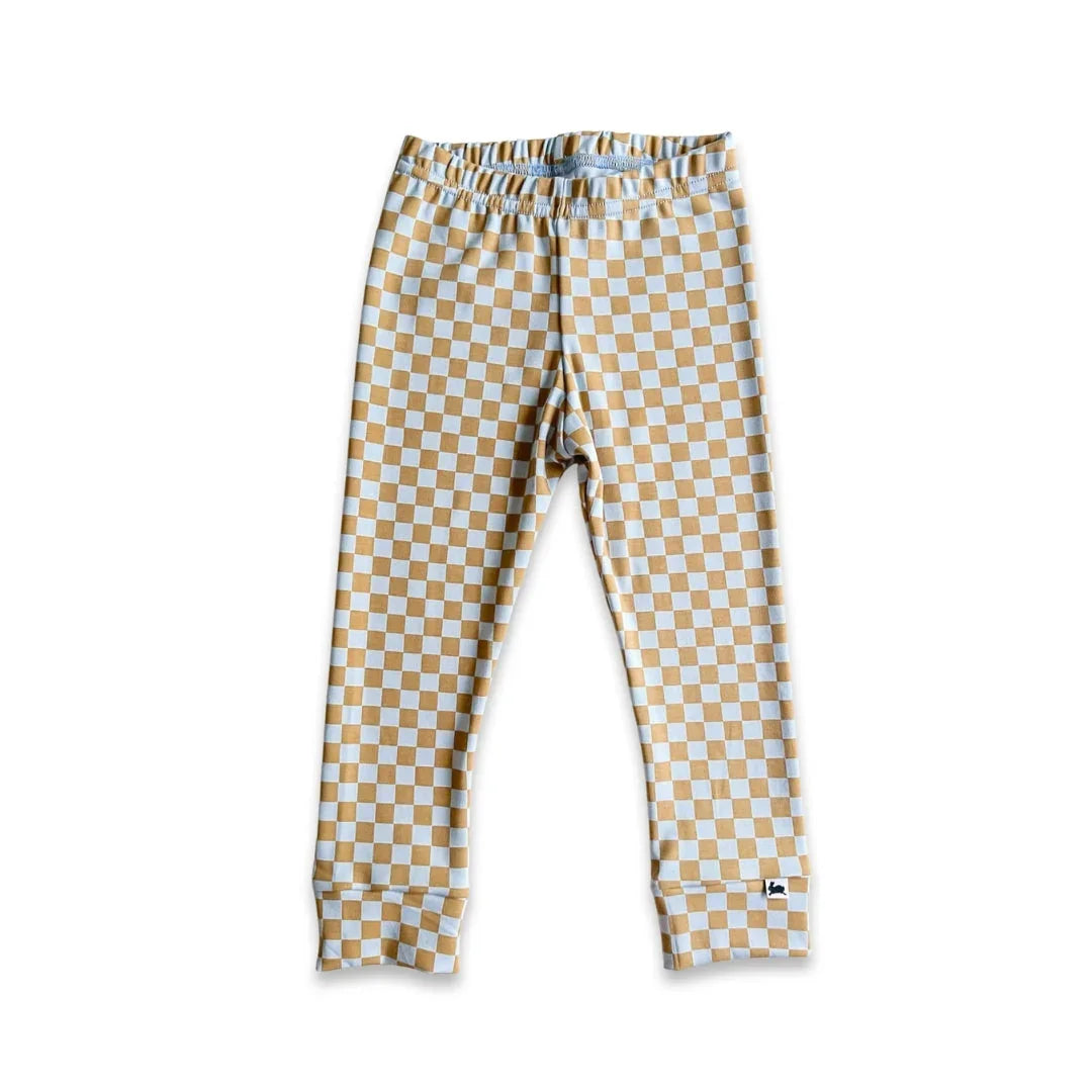 Kids yellow and white checkered leggings with elastic waist on white background