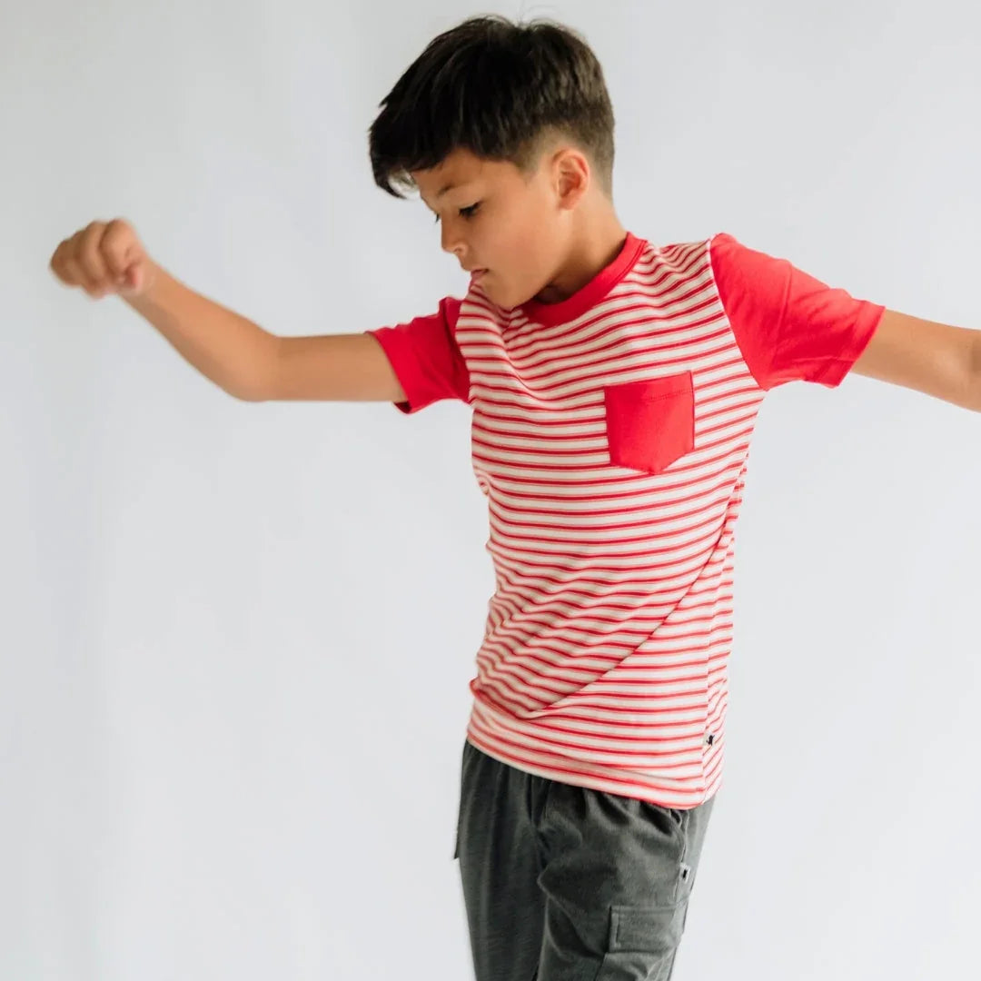 Boy wearing red and white striped youth pocket tee with red sleeves and chest pocket