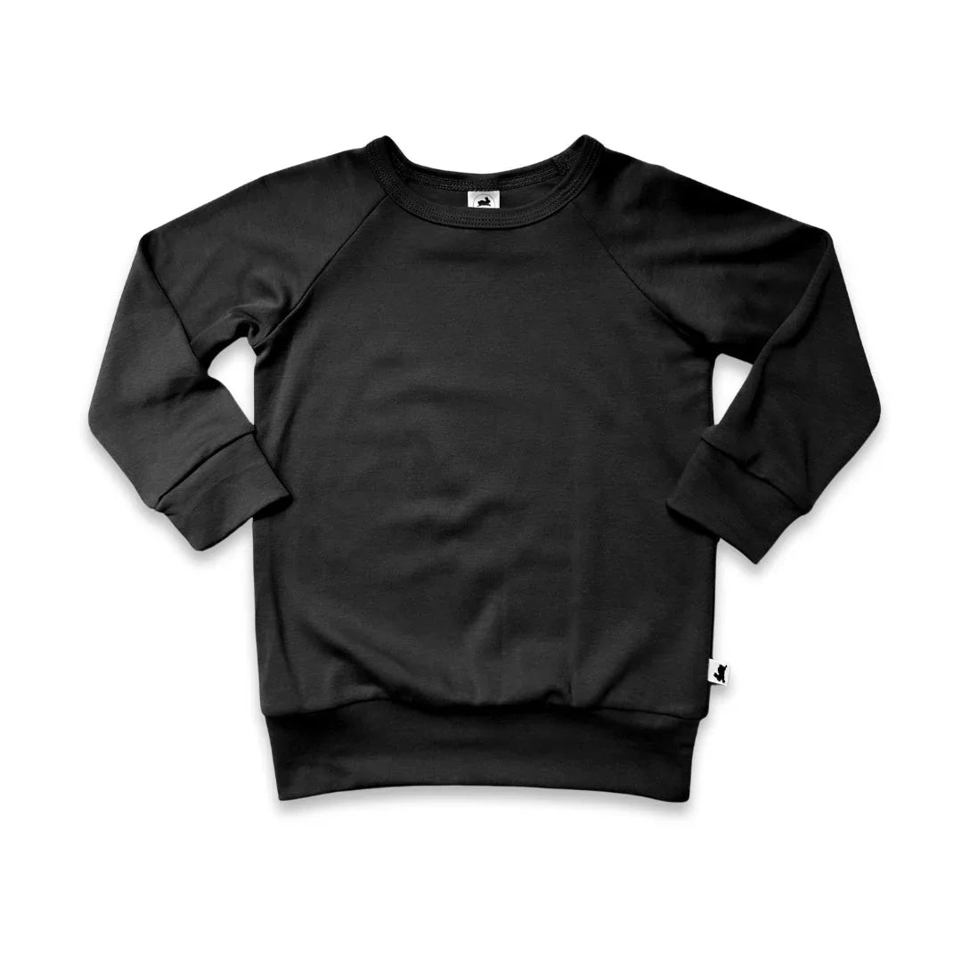 Black crewneck sweatshirt for kids on white background, long sleeve cotton pullover