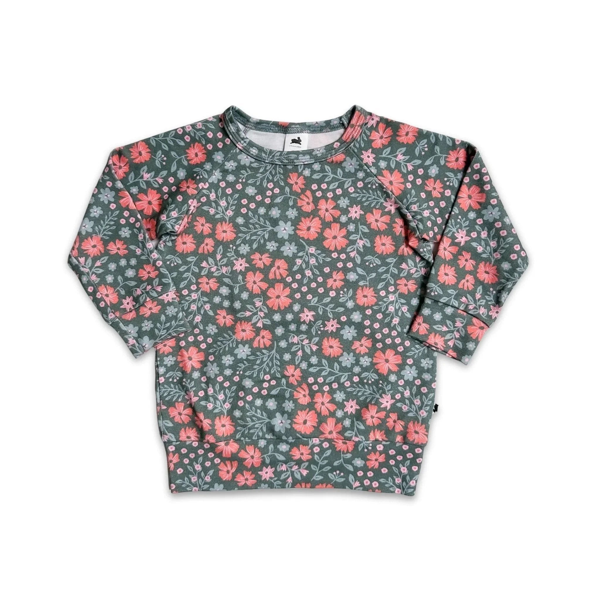 Youth bamboo raglan pullover with green and pink floral print, long sleeves, laid flat