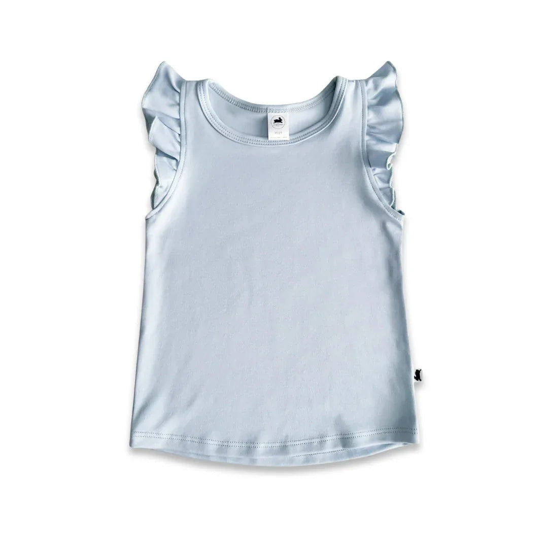 Light blue sleeveless toddler top with ruffle shoulders on white background
