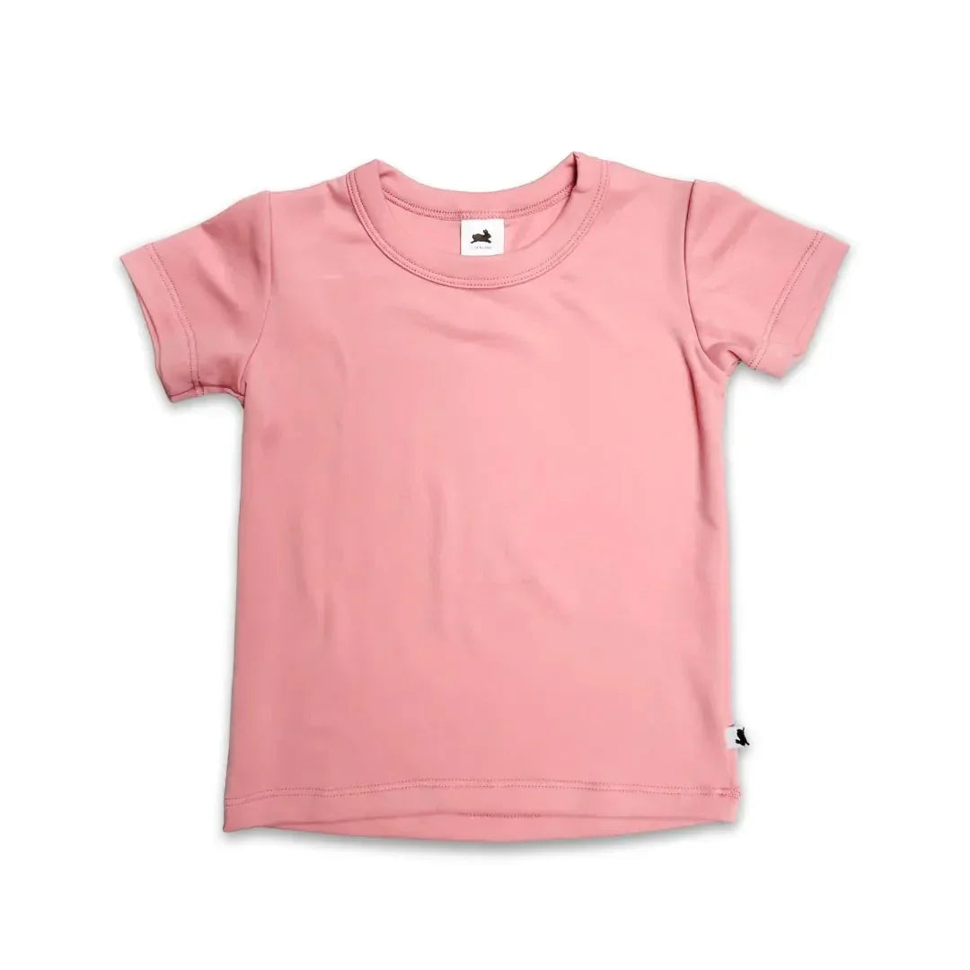 Pink youth bamboo t-shirt with short sleeves, flat lay on white background
