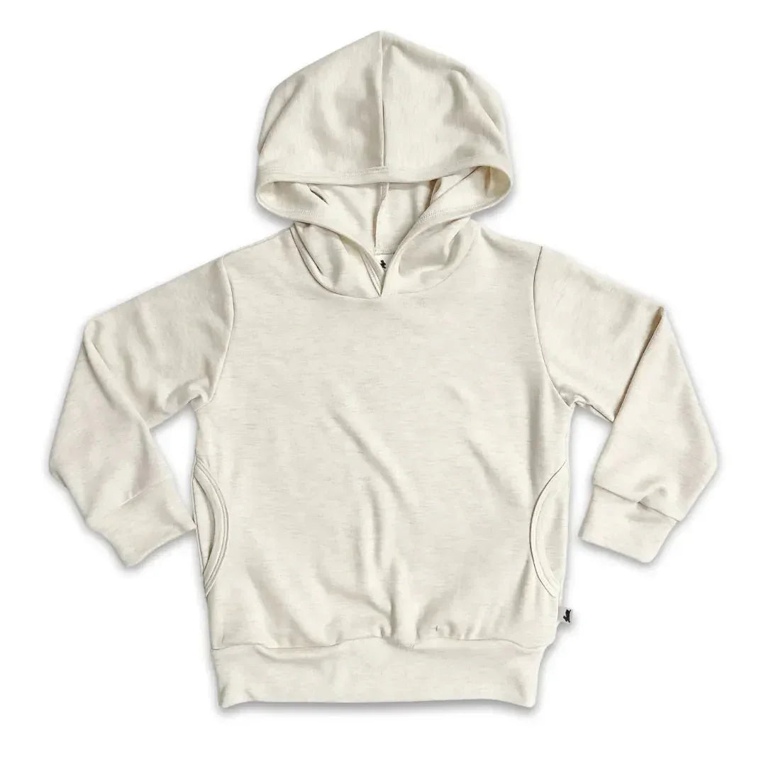 Youth lightweight bamboo hoodie in cream color with front pockets, displayed on white background