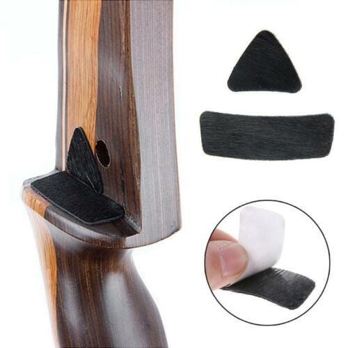 Archery arrow rest patch set for recurve bow with adhesive backing, close-up view.