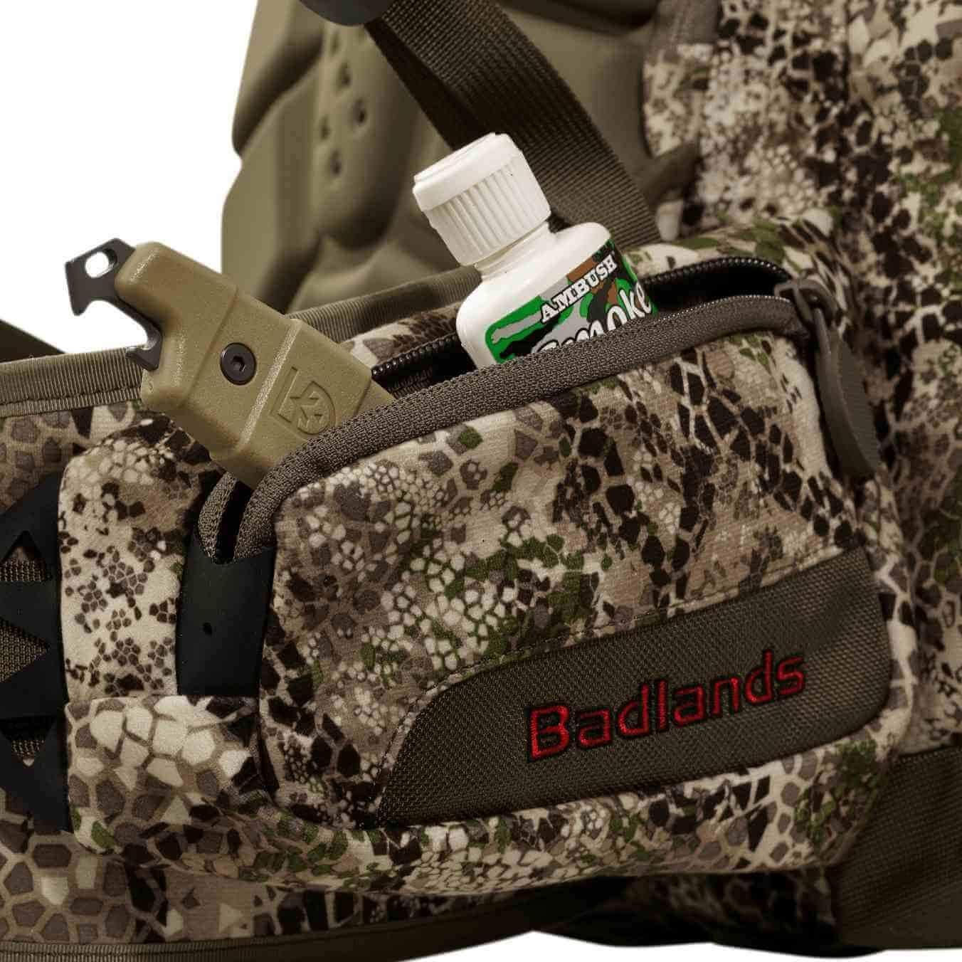Badlands camo hunting backpack with Ambush smoke bottle in zip pocket