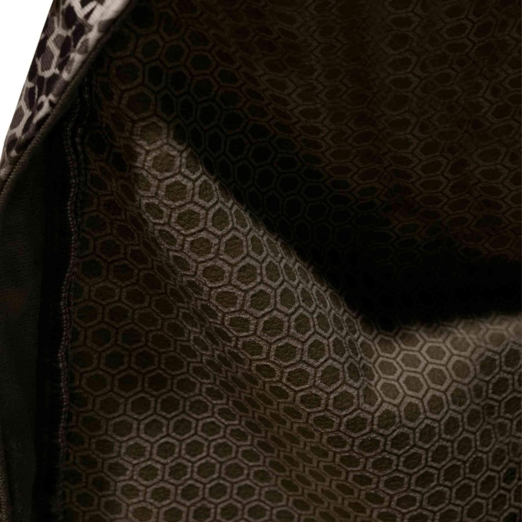 Close-up of hexagonal pattern fabric inside Badlands Calor Pant, outdoor apparel detail