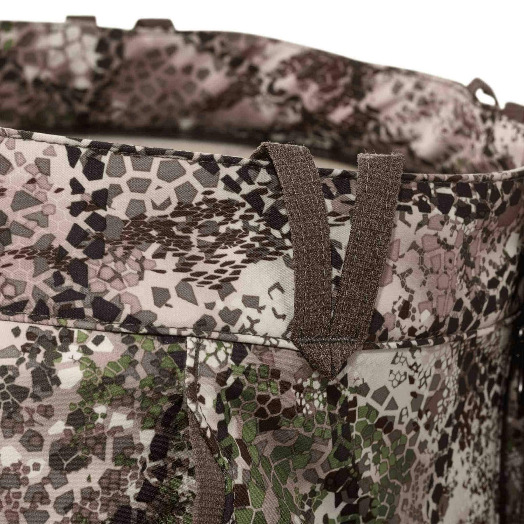 Close-up of Badlands Ion X camo pants with hex camo pattern and reinforced belt loops