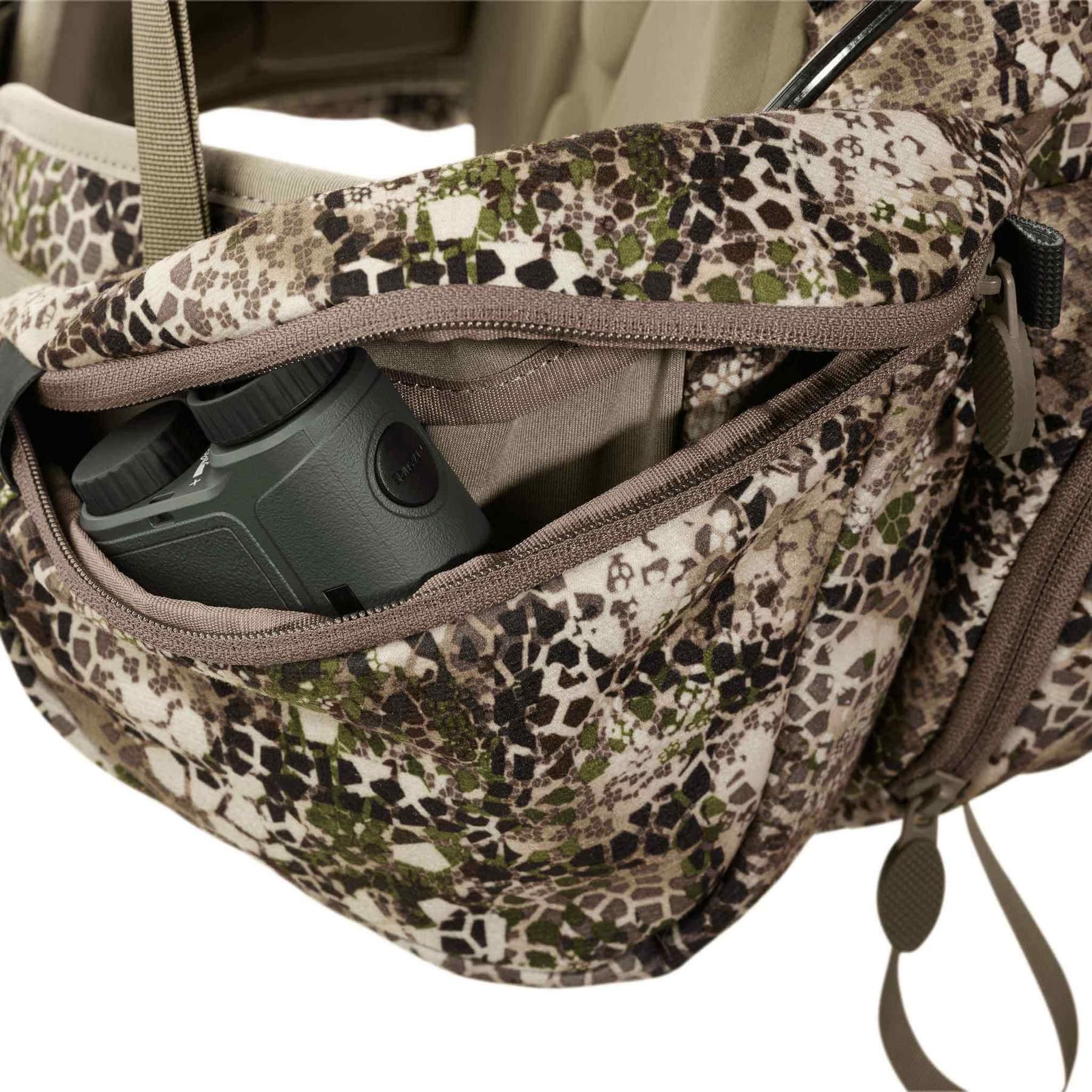 Camo Badlands Monster fanny pack with binoculars in zippered pocket, outdoor gear