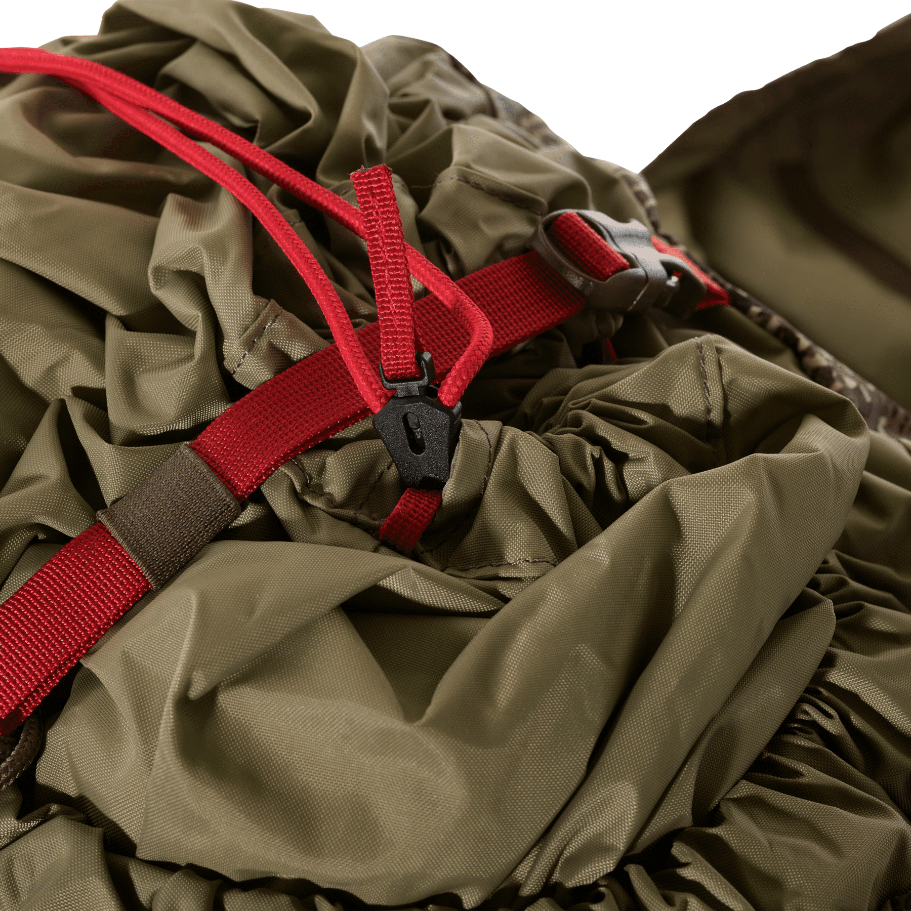 Close-up of olive green hiking backpack with red straps and black buckle
