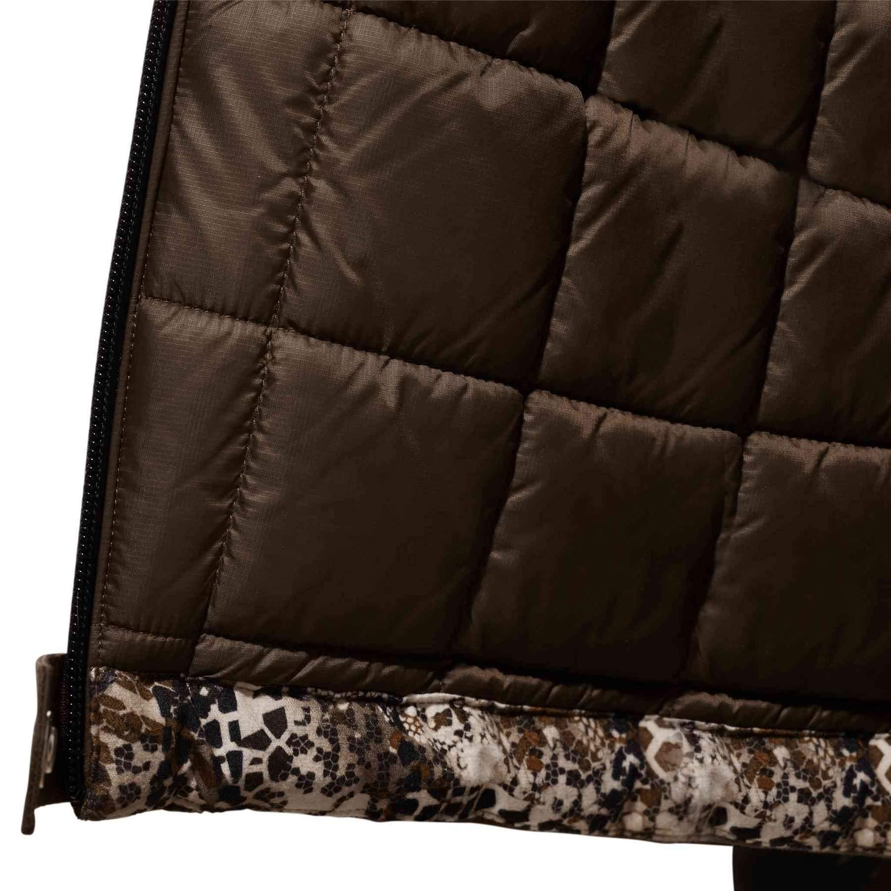 Close-up of quilted brown insulated fabric with camouflage trim, outdoor apparel detail