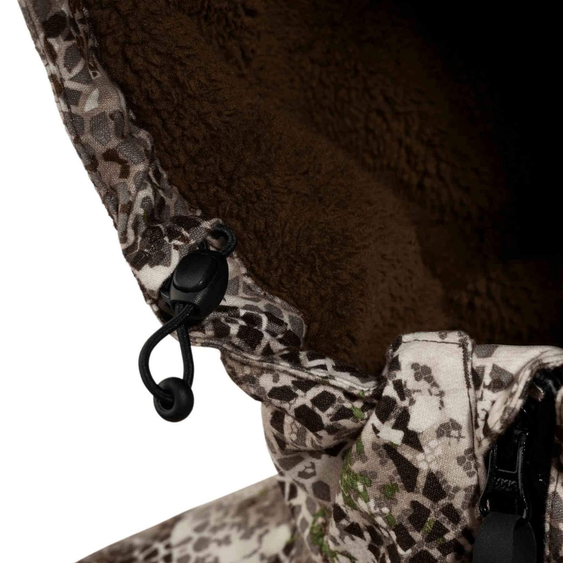 Close-up of Badlands Pyre Jacket hood with camo pattern and fleece lining
