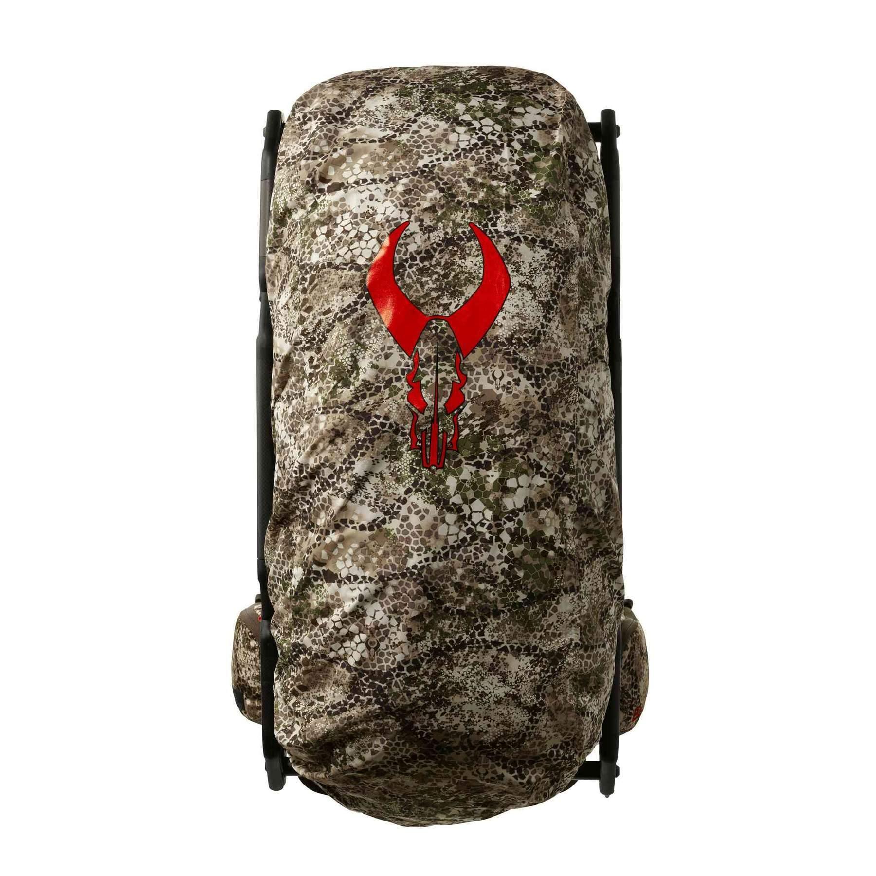Badlands camo rain cover on backpack with red skull logo, outdoor gear display