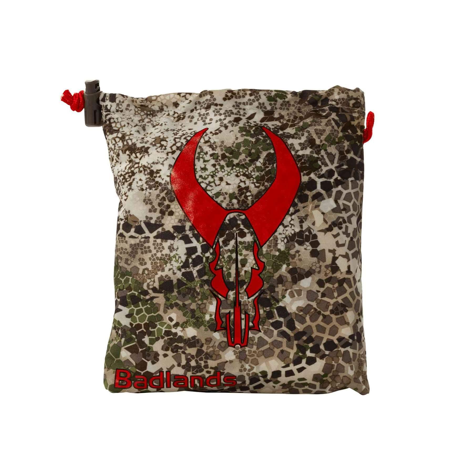 Badlands camo rain cover pouch with red logo and drawstring, outdoor gear accessory