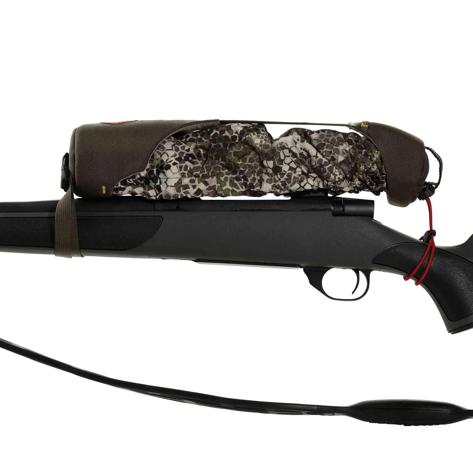 Badlands camo rifle scope cover on black hunting rifle against white background