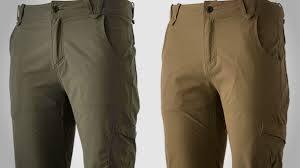 Badlands Scree Pants in olive green and khaki, displayed on mannequins against a plain background.