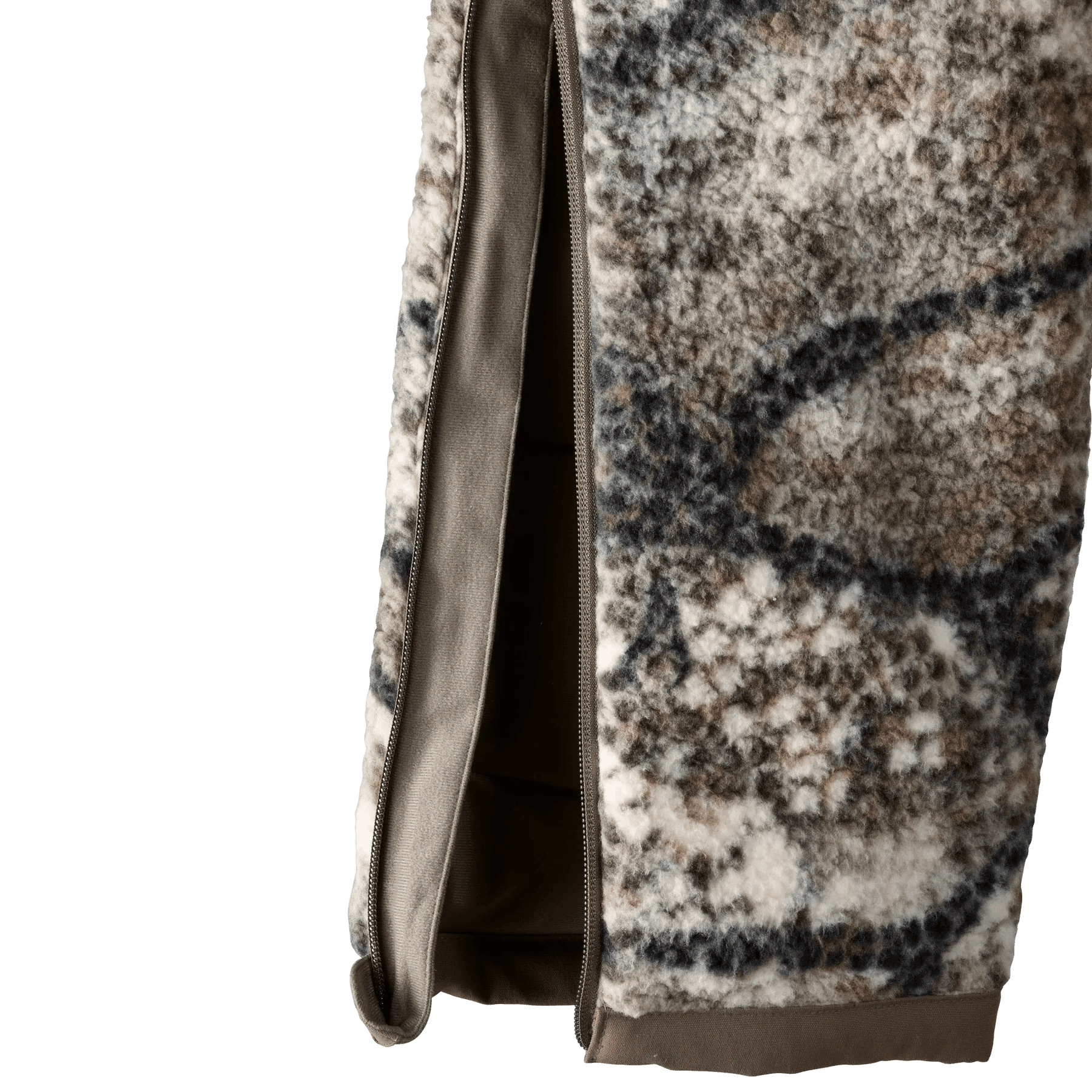 Close-up of Badlands Silens Pant with camo fleece fabric and side zipper detail