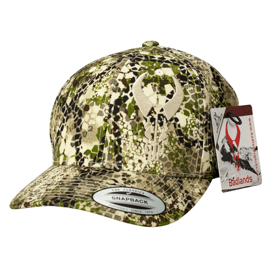 Badlands snapback cap with green and tan camo pattern and logo, outdoor sports apparel