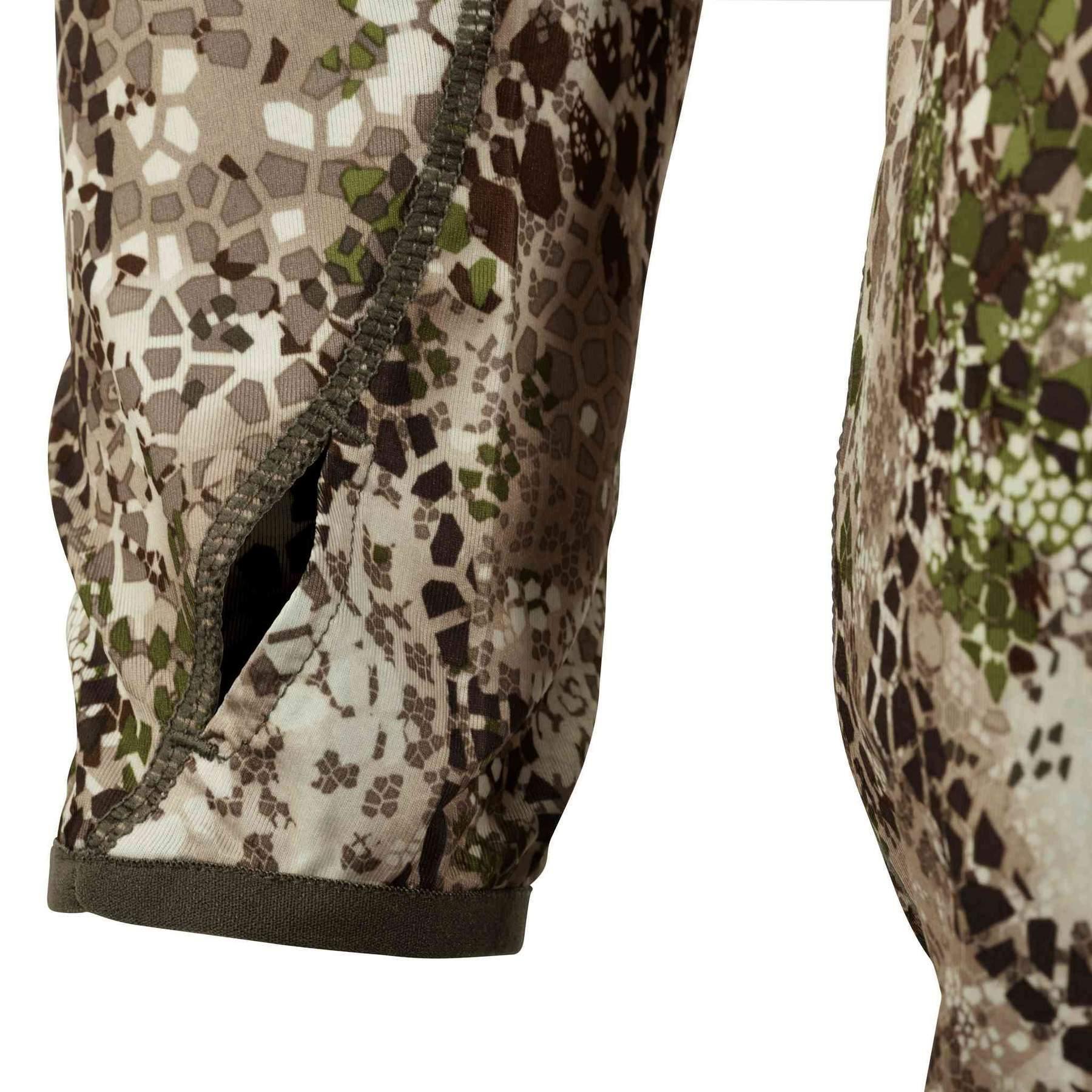 Close-up of Badlands Stealth CoolTouch Hoodie sleeve with camo pattern and thumb hole.