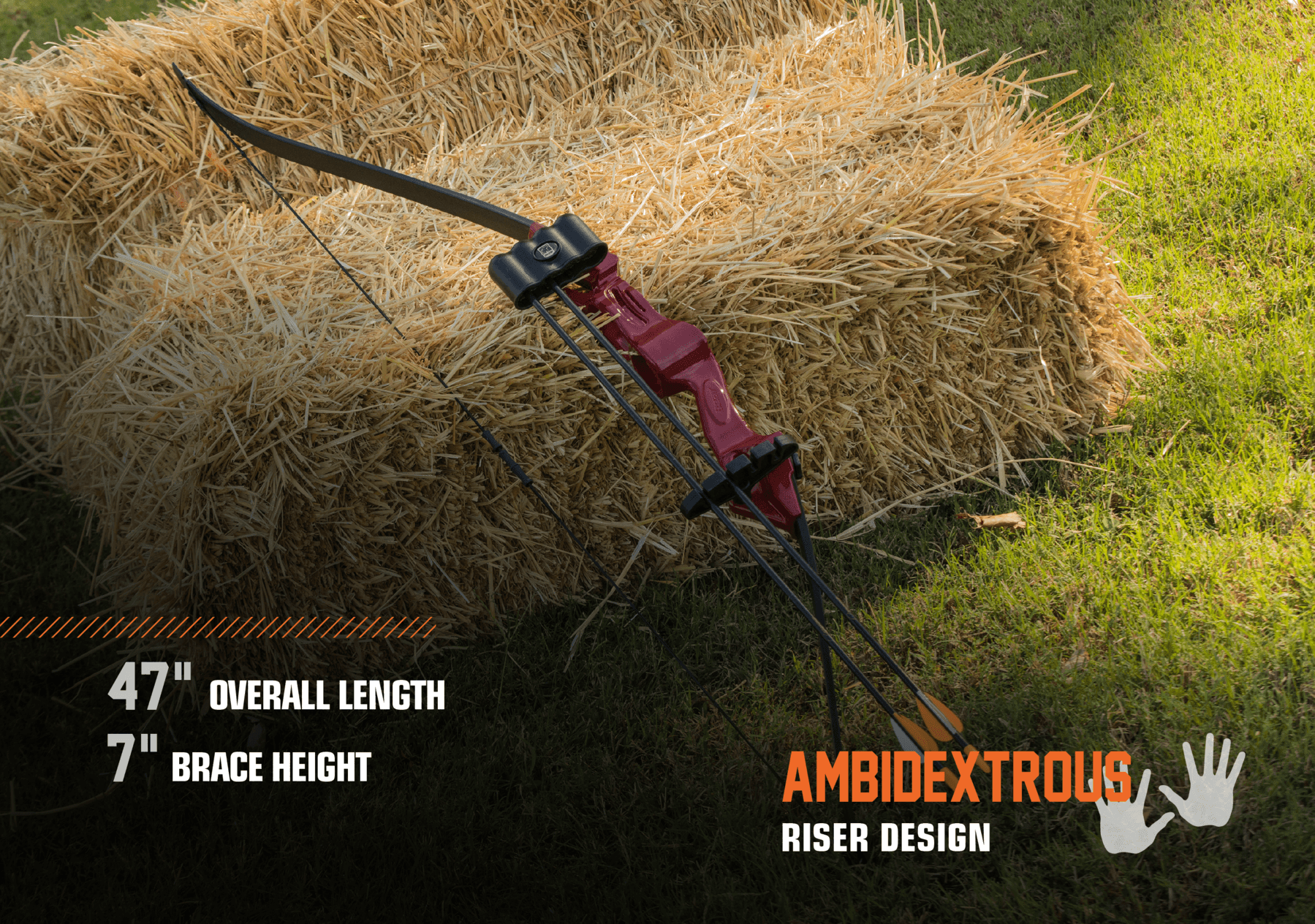 Bear Archery Flash youth recurve bow with red riser, resting on hay bale outdoors