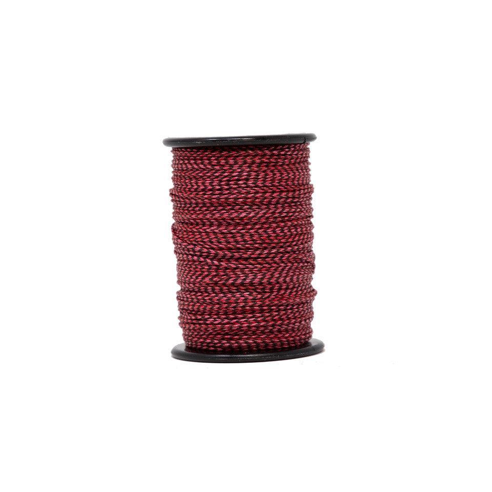 Bohning Archery 62 XS serving thread spool, red and black, on white background