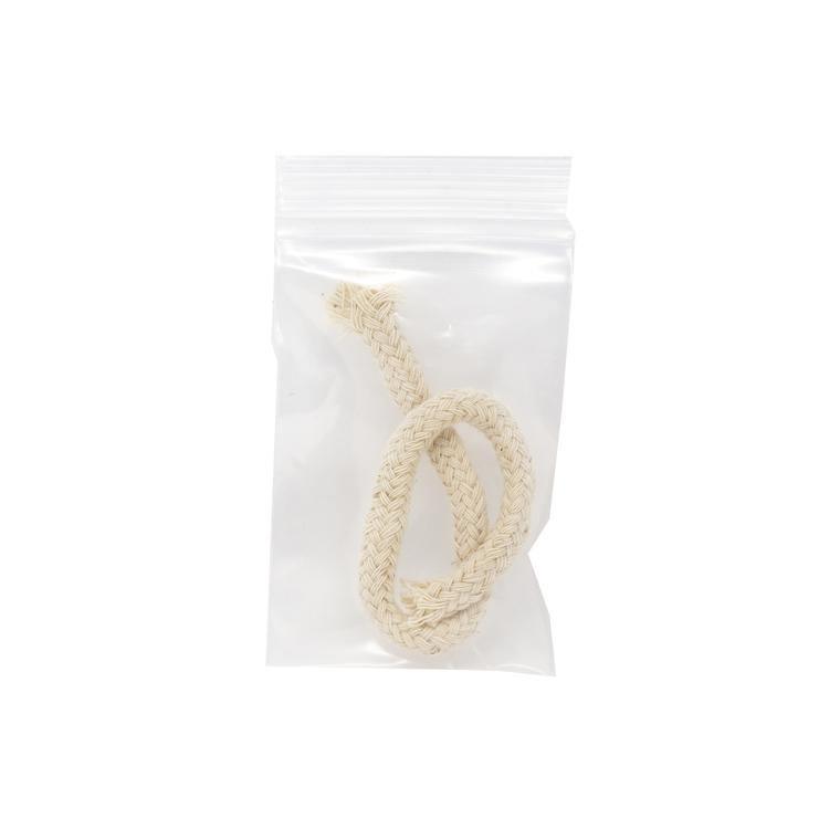 Braided alcohol burner replacement wick in clear plastic bag on white background