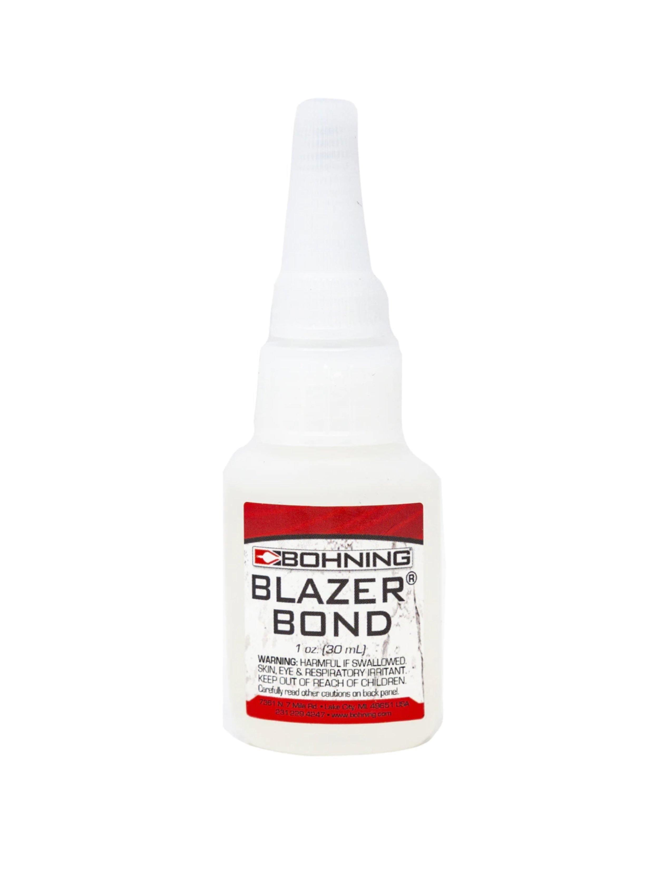 Bohning Blazer Bond glue bottle for archery, white with red label, isolated on white background
