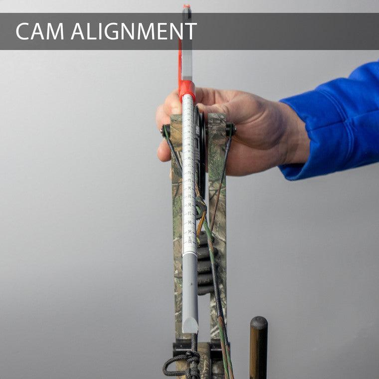 Bohning Archery Bow Square tool aligning a compound bow cam, close-up outdoors
