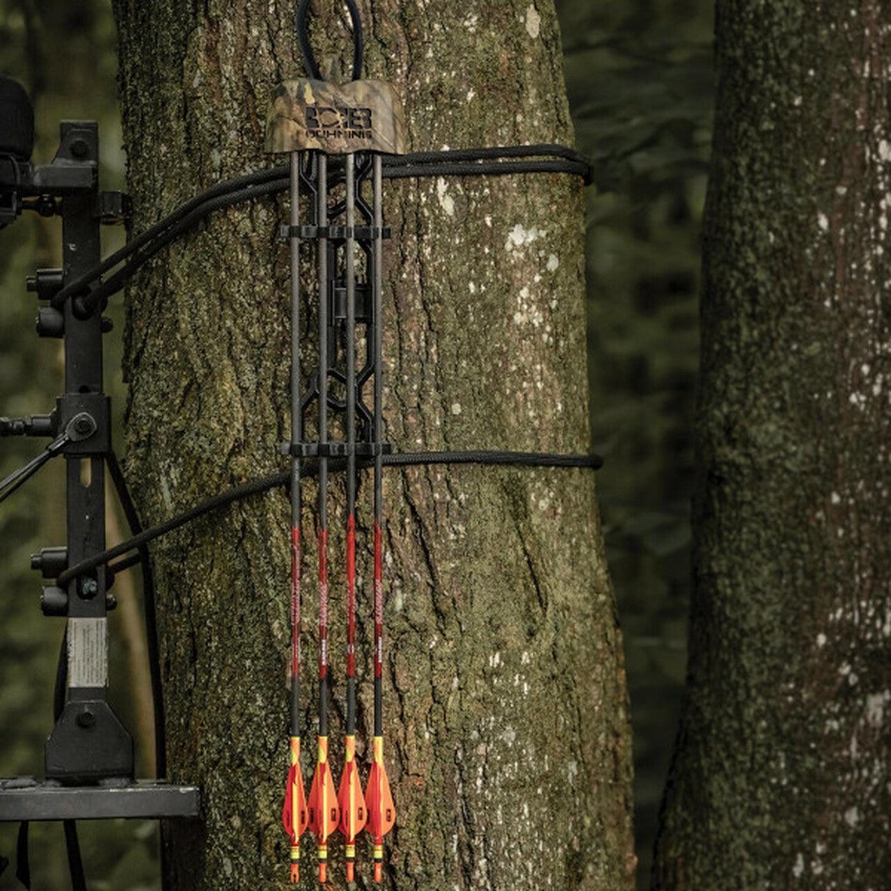 Bohning Archery Bruin quiver with arrows mounted on a tree outdoors in the forest