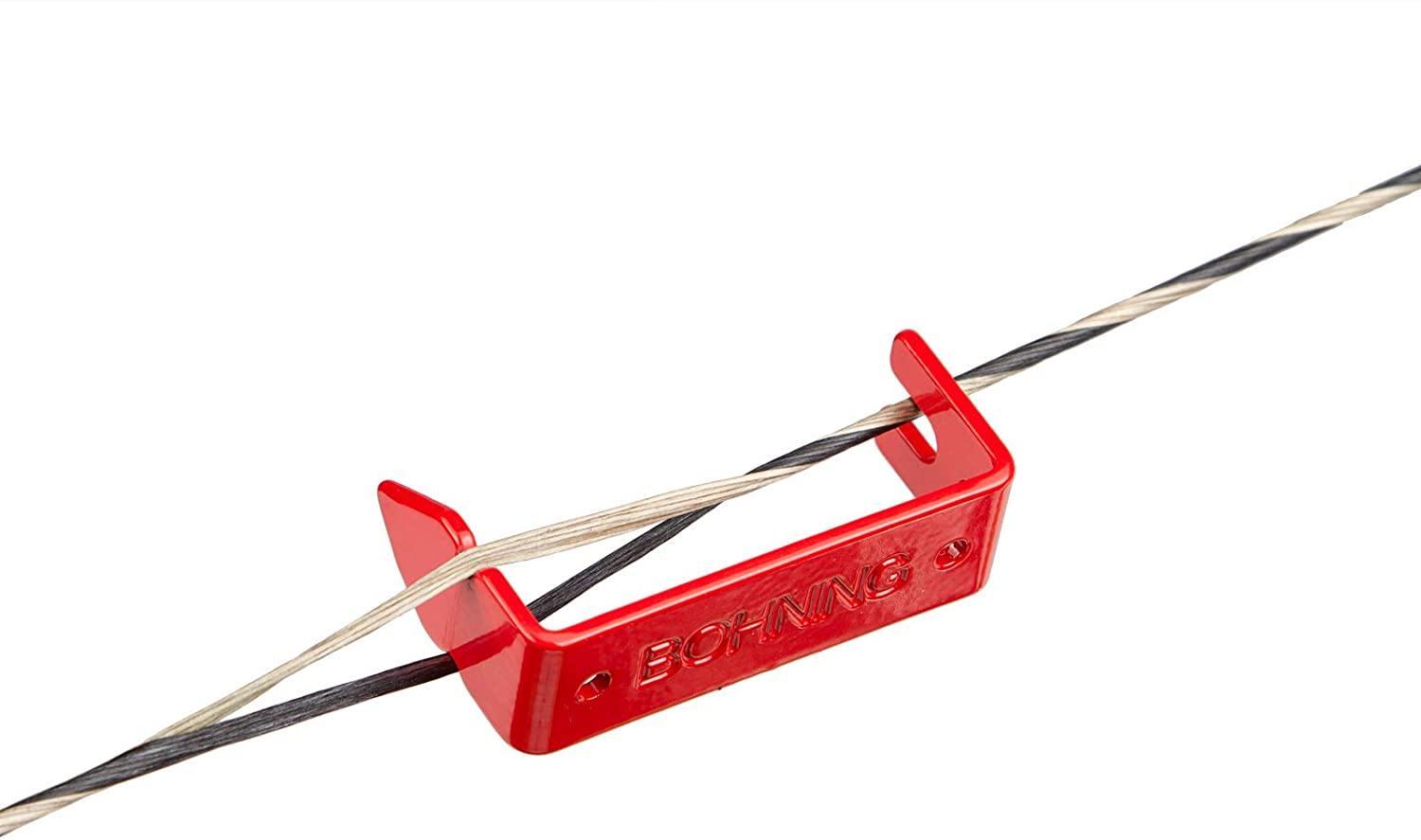 Red Bohning archery string separator on a dual-color bowstring, white background