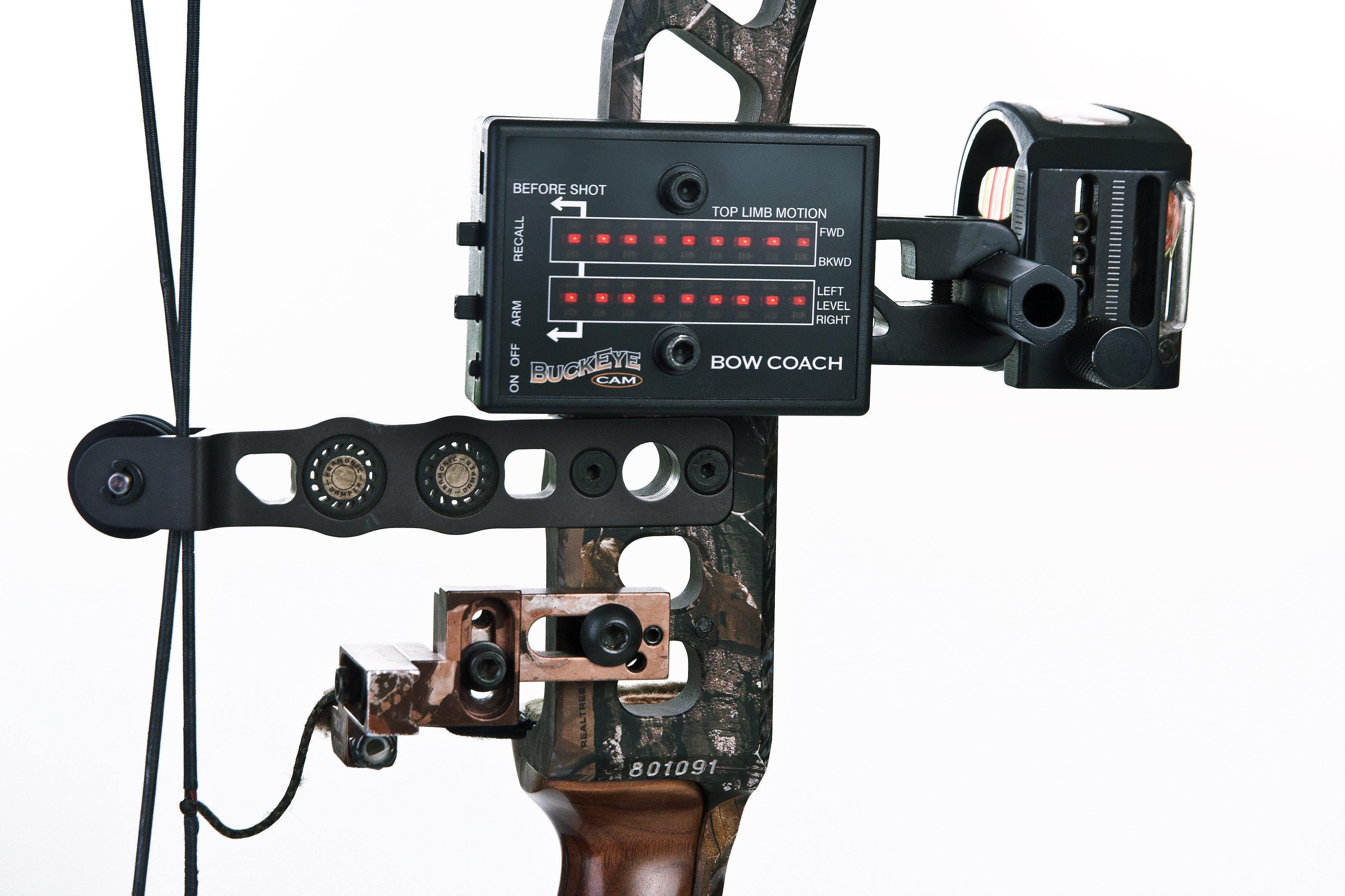 Buckeye Cam Bow Coach kit mounted on camouflage archery bow with digital limb motion display