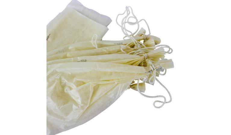 Pack of chard fibrous sausage casings with strings for meat processing