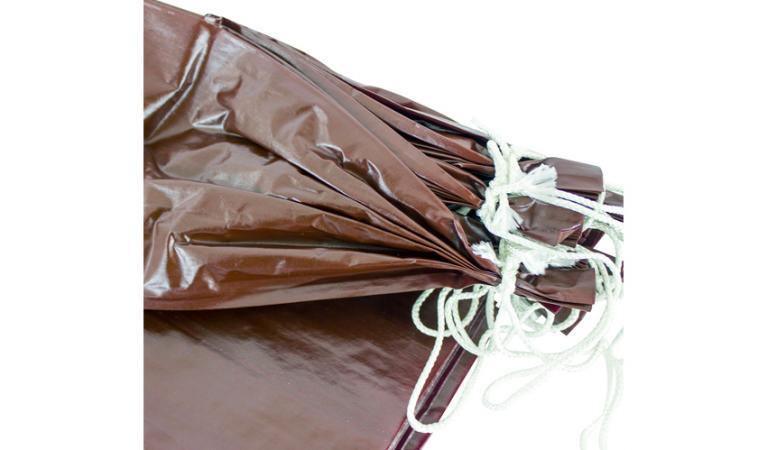 Brown fibrous sausage casings with white string, Chard 10 pack on white background