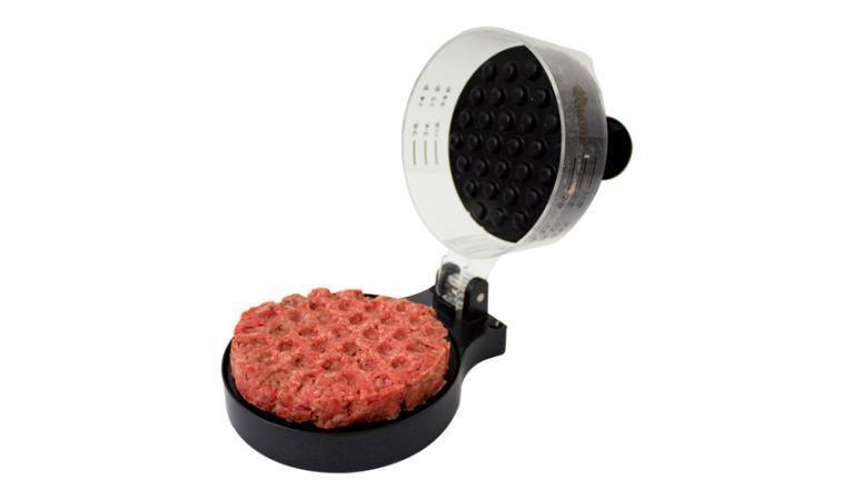 Chard burger press with raw ground beef patty in molding tray on white background