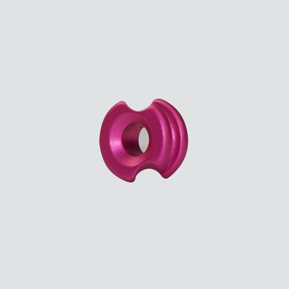 Pink Clearshot Archery Speed Peep sight on a plain grey background