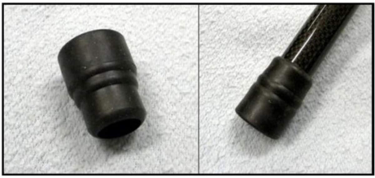 Conquest Archery weight bumper black rubber accessory for stabilizer on a light fabric background