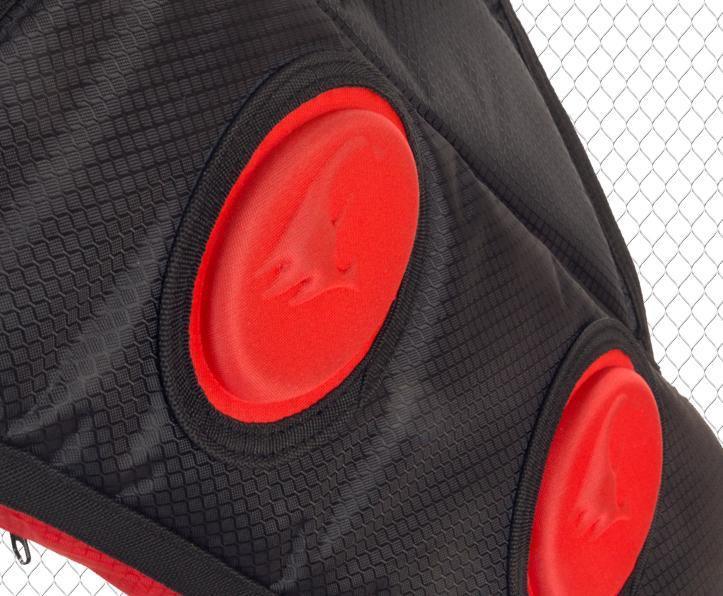 Close-up of Elevation Archery Adrenalin hip quiver, black with red padded accents.
