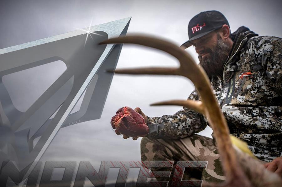 G5 Outdoors Montec broadhead closeup with hunter in camo holding deer heart and antlers