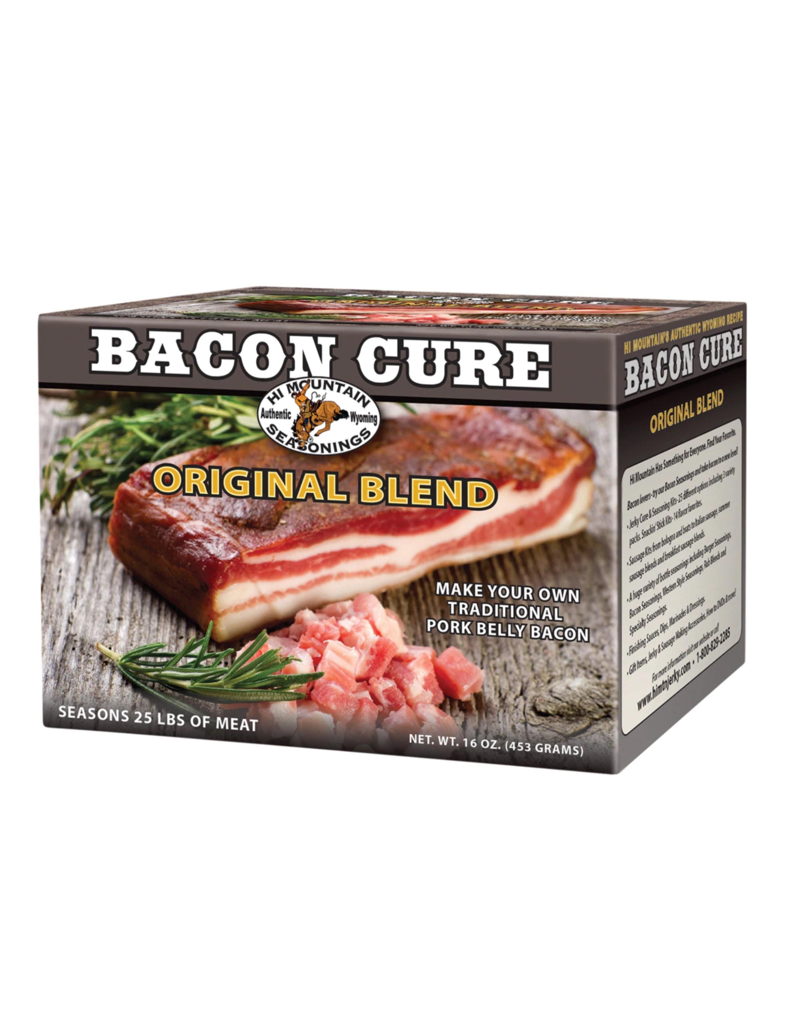 Hi Mountain Bacon Cure Original Blend box with pork belly and herbs on wooden surface
