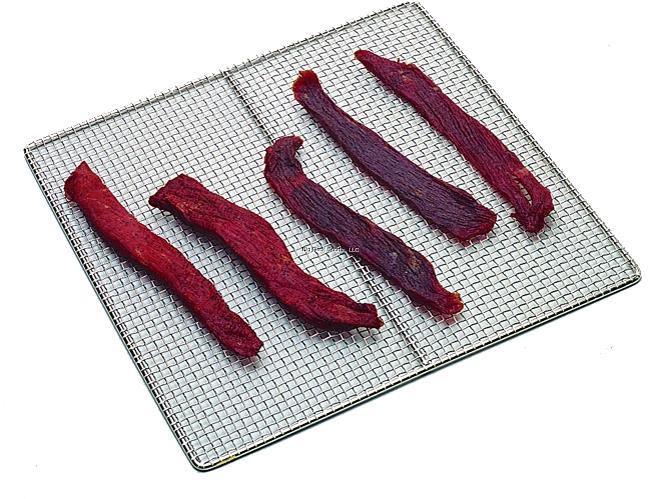 Beef jerky strips on metal drying rack, Hi Mountain Jerky, outdoor food preparation
