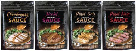 Hi Mountain Finishing Sauces assortment with chicken, steak, pork, and beef on packaging