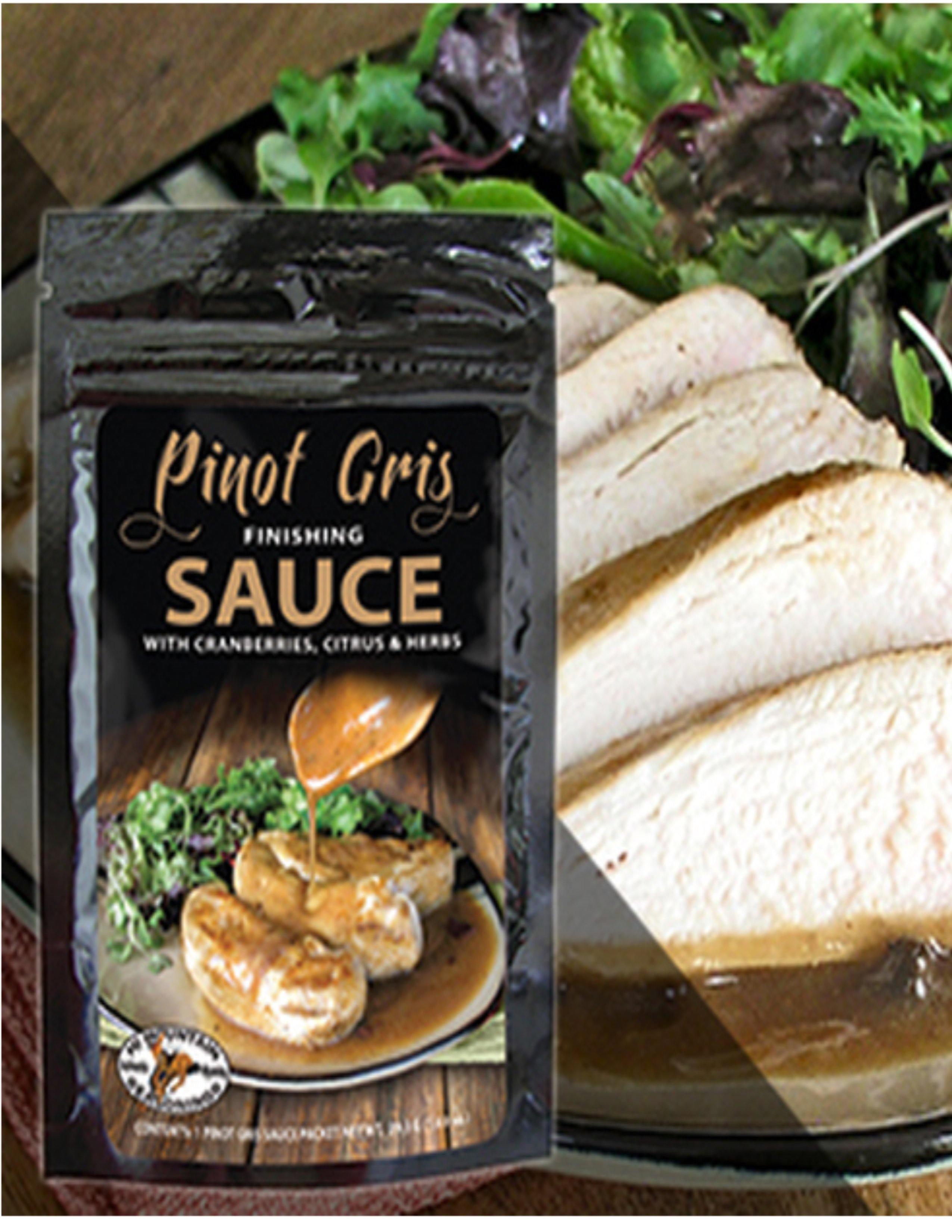 Pinot Gris finishing sauce packet with chicken, salad, and sauce in the background