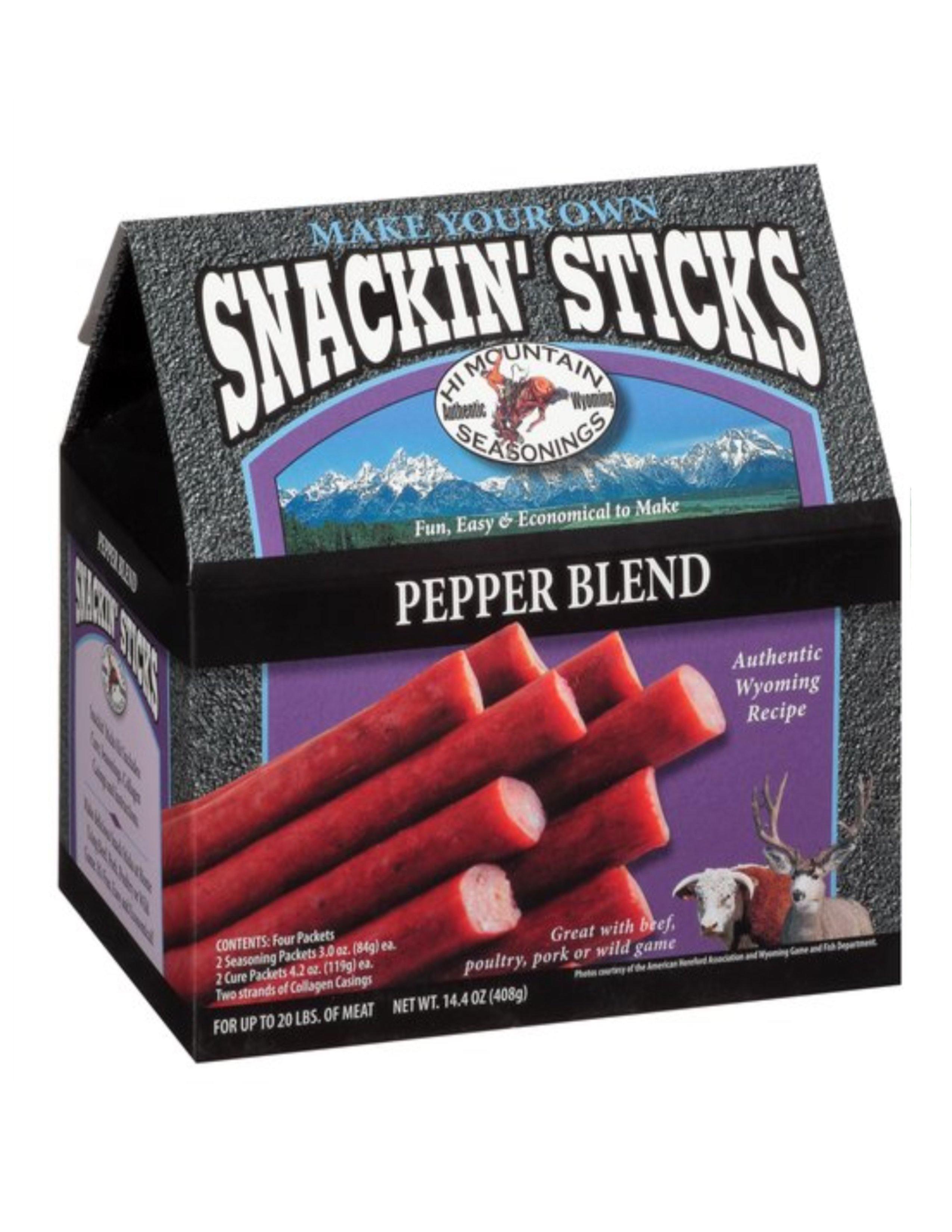 Hi Mountain Snackin' Sticks Pepper Blend kit box with meat snack sticks, Wyoming mountains.