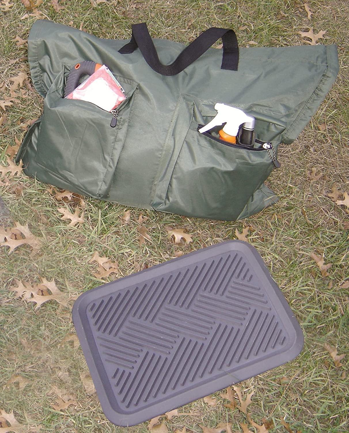 Scent free storage bag with pockets and mat on grass, outdoor gear ideal for hunting.