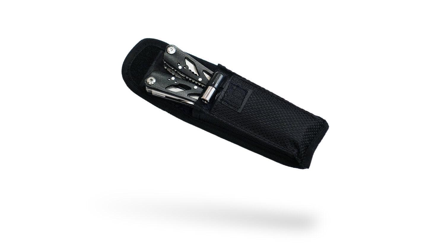 Multi-tool with black pouch for archery or outdoor use on white background
