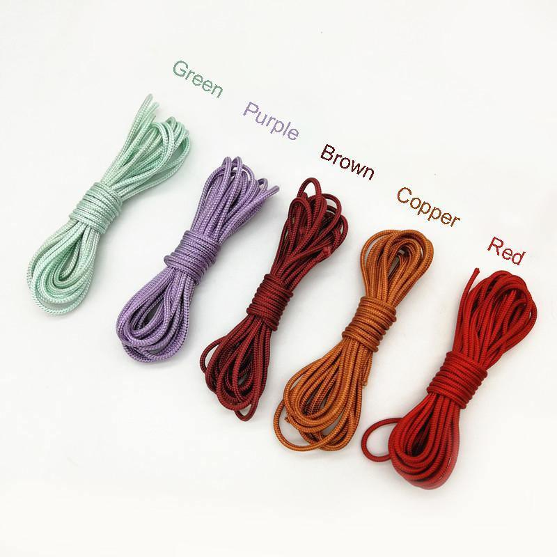 Five Leapfrog archery string loop ropes in green, purple, brown, copper, and red.